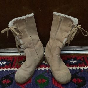 Camel suede leather with synthetic fur lining, comfortable and warm .